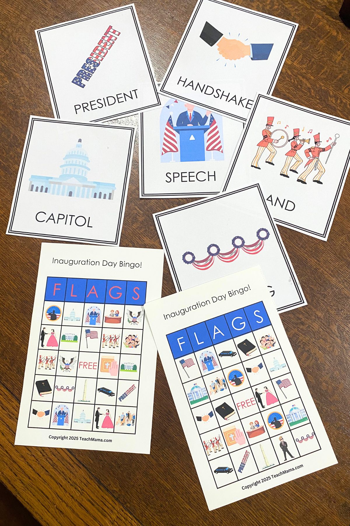 Bingo cards and patriotic images printed on white cardstock on a wooden table.