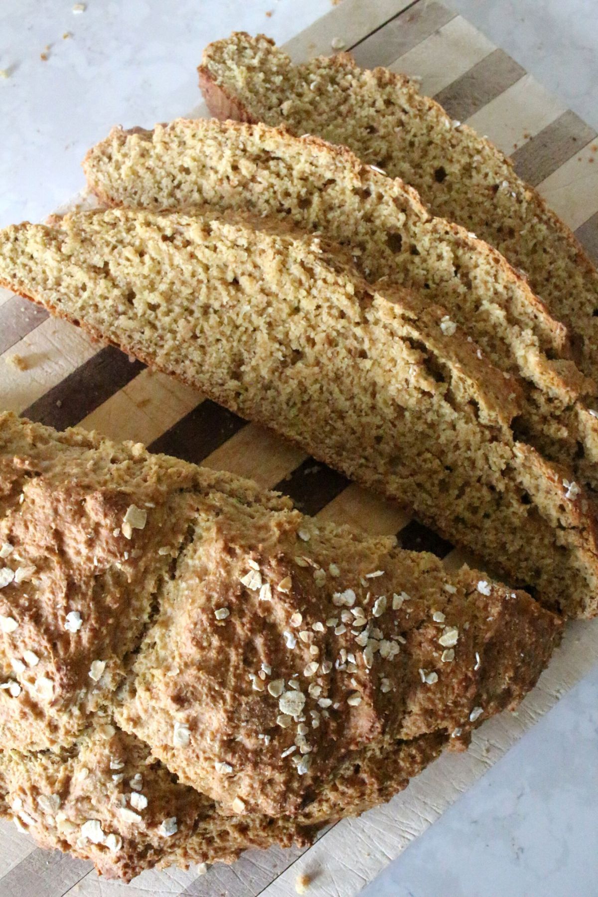 Slices of Irish Soda Bread on a wooden cutting board