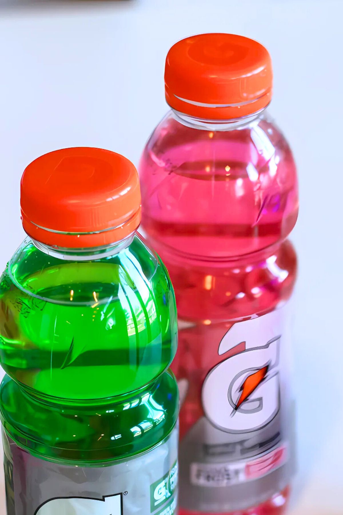 Red and green sports drink bottles