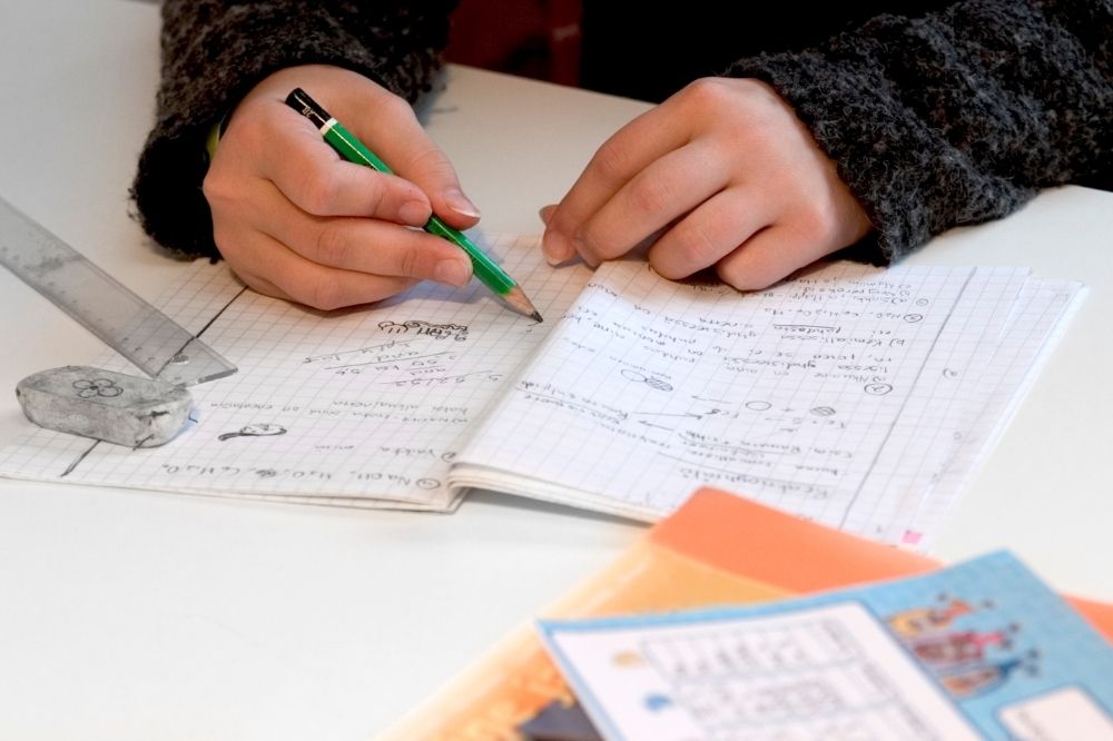 Kid solving math problem