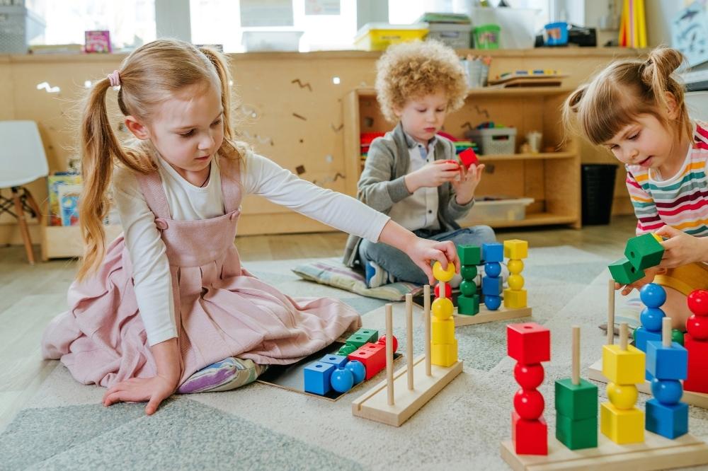 kinder garten kids playing in the classroom