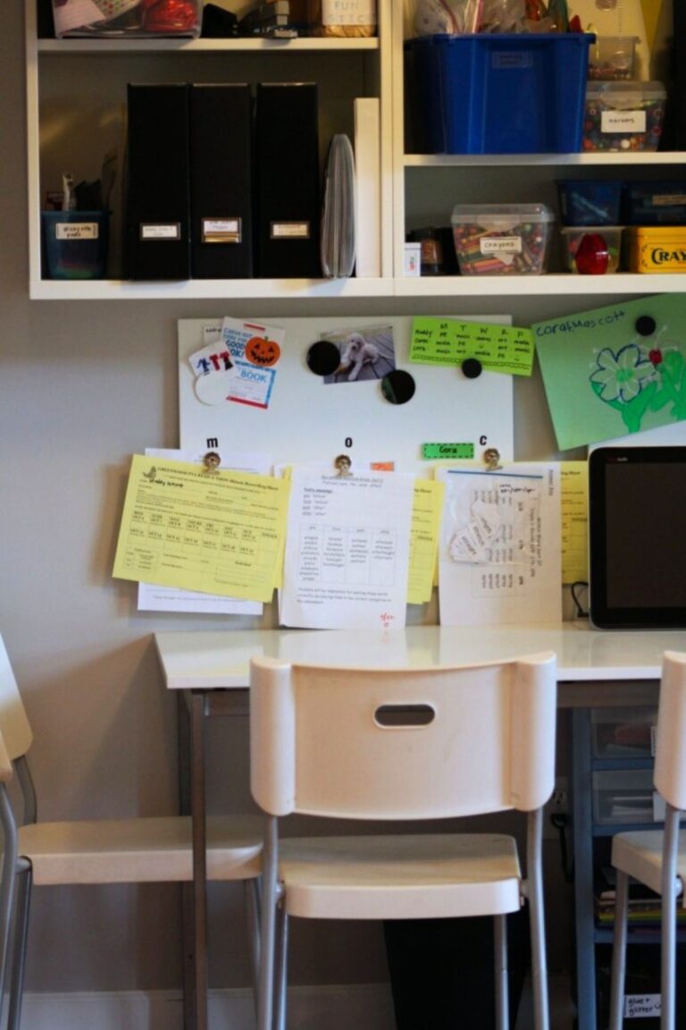 Kid's study table with magnetic whiteboard and cubbies above