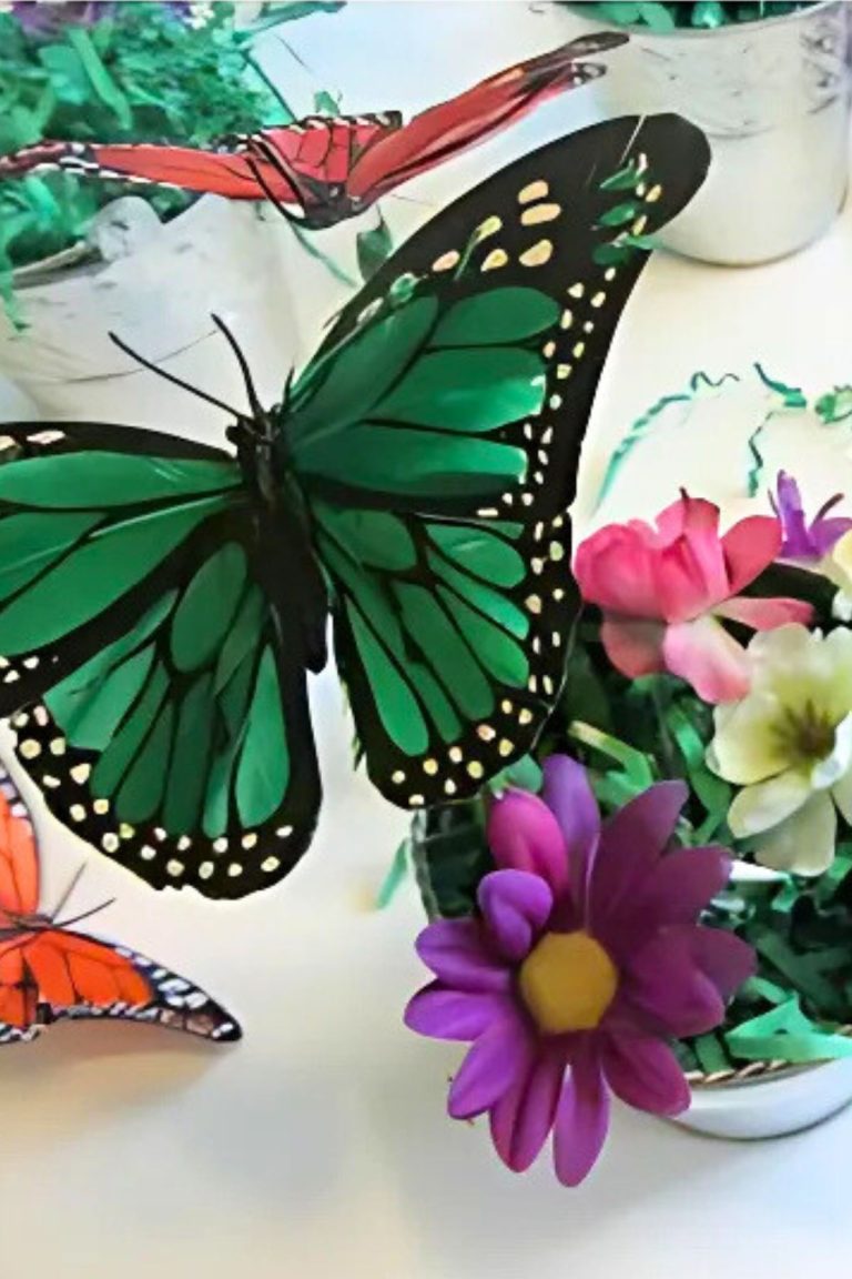 Bright green silk butterfly on an ink pen in a bucket with colorful silk flowers