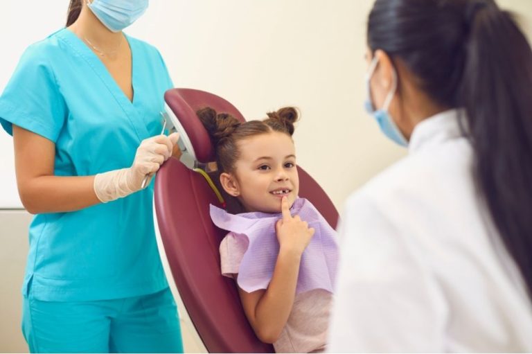 A kid visiting her dentist