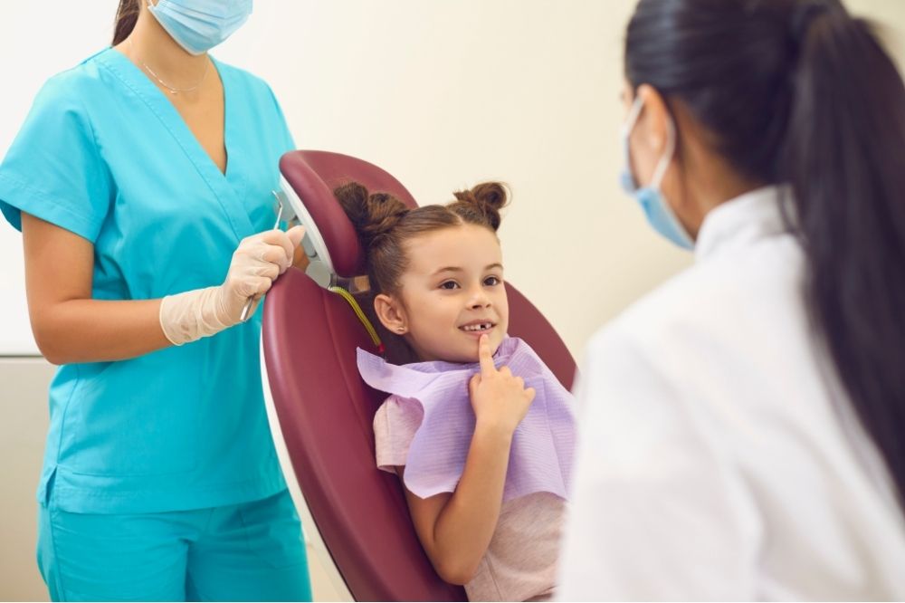 A kid visiting her dentist
