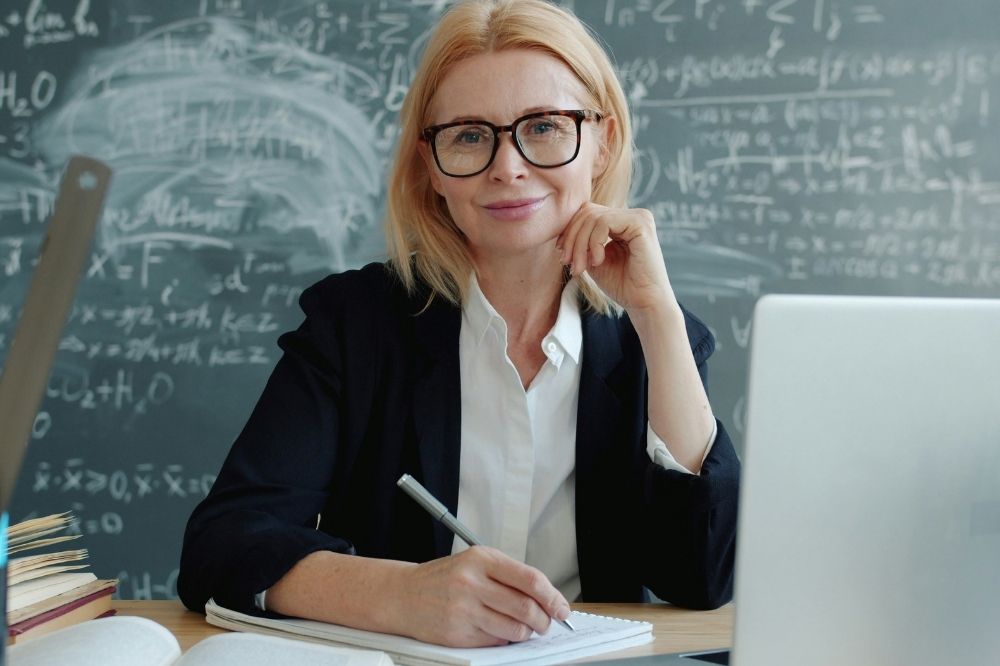 Teacher sitting in the classroom