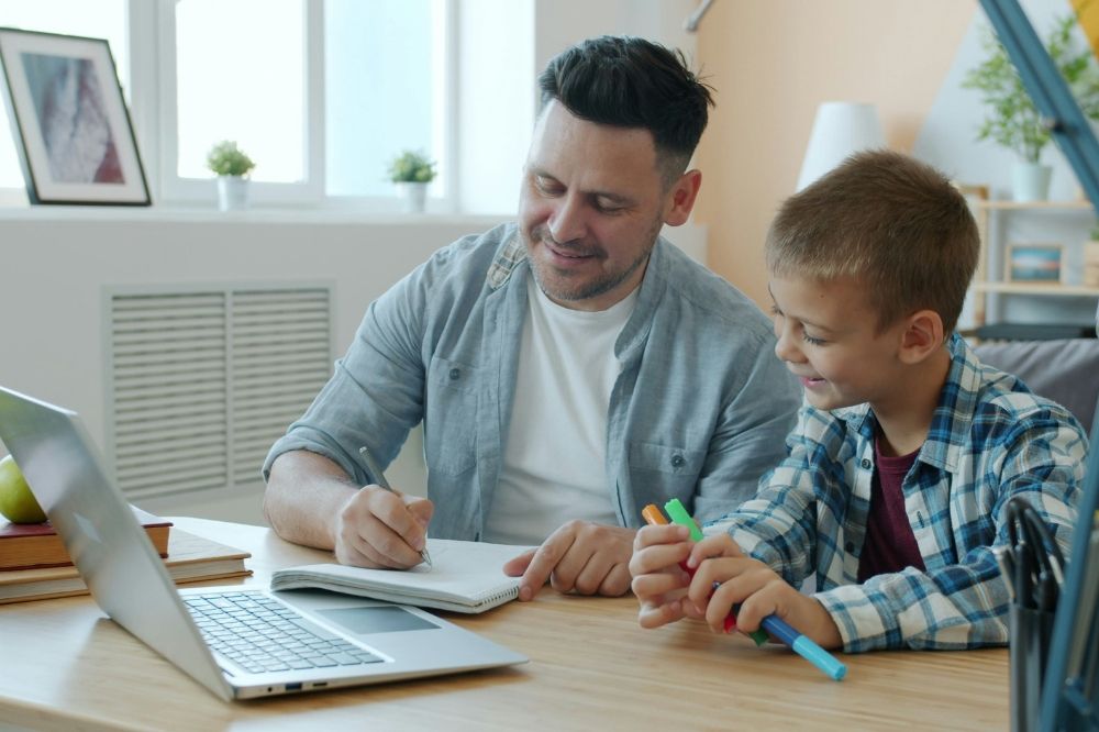 Father teaching his kid